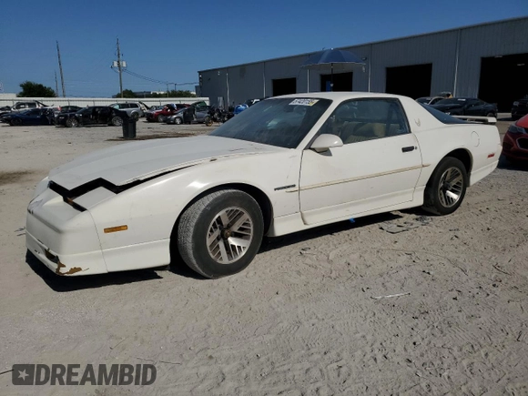 1989 Pontiac Firebird z VIN 1G2FS21S4KL260438, wystawiony jako Copart lot #57420155 z przebiegiem 132 101 mil mil oraz Czysty tytuł • Clean title. Historia ofert i sprzedaży dostępna na DreamBid. Obrazek 2.