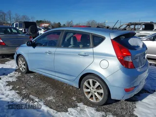 2012 Hyundai Accent SE with VIN KMHCU5AEXCU032097, listed as a IAAI auction lot 41143303 with 29,828 mi miles. Bid and sale history available at carsss.com. Image 3.