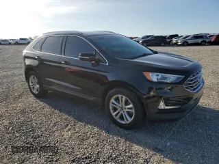 2019 Ford Edge SEL z VIN 2FMPK4J91KBC60322, wystawiony jako Copart lot #53502375 z przebiegiem 103 430 mil mil oraz Szkoda całkowita • Salvage title. Historia ofert i sprzedaży dostępna na DreamBid. Obrazek 4.