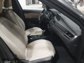 2016 BMW X1 xDrive28i with VIN WBXHT3C3XG5E47536, listed as a IAAI auction lot 41672144 with 97,932 mi miles. Bid and sale history available at carsss.com. Image 5.