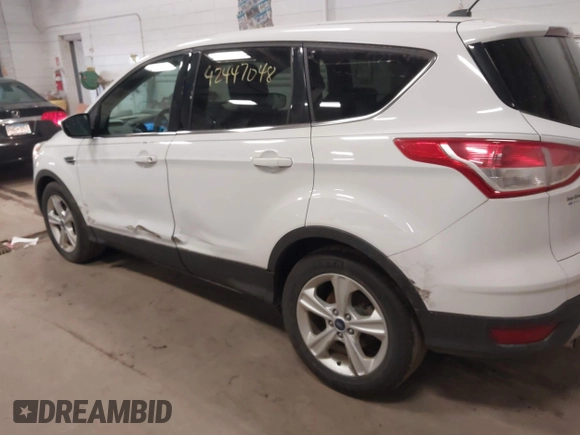 2013 Ford Escape SE with VIN 1FMCU0GX5DUA74237, listed as a IAAI auction lot 42447048 with 140,732 mi miles and . Bid and sale history available at DreamBid. Image 6.