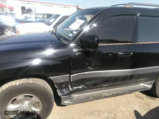 2001 Toyota Land Cruiser with VIN JTEHT05J512016563, listed as a IAAI auction lot 41868193 with 247,653 mi miles. Bid and sale history available at carsss.com. Image 6.