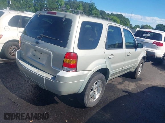 2005 Ford Escape Limited with VIN 1FMYU04135KA96157, listed as a IAAI auction lot 42339869 with 202,712 mi miles and . Bid and sale history available at DreamBid. Image 4.