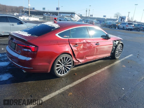2018 Audi A5 Sportback Prestige z VIN WAUCNCF5XJA052165, wystawiony jako IAAI lot #41321114 z przebiegiem 62 648 mil mil oraz . Historia ofert i sprzedaży dostępna na DreamBid. Obrazek 4.