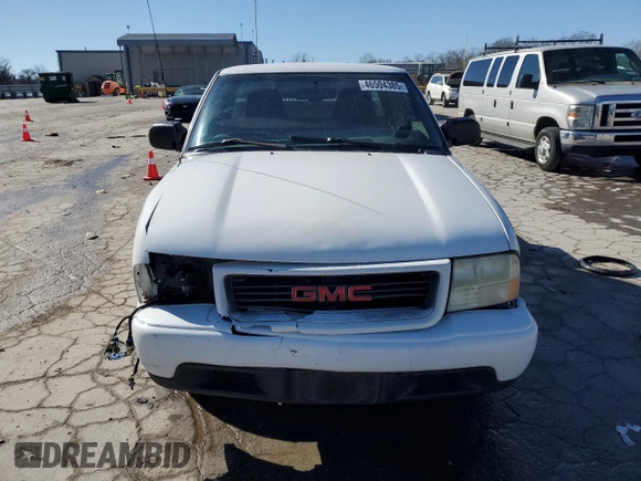 2001 GMC Sonoma SLS 1SG z VIN 1GTCS19W118257613, wystawiony jako Copart lot #46504385 z przebiegiem 217 842 mil mil oraz Szkody całkowita. Historia ofert i sprzedaży dostępna na DreamBid. Obrazek 5.