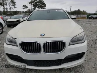 2015 BMW 7 Series 750i z VIN WBAYA8C5XFD825662, wystawiony jako Copart lot #78850474 z przebiegiem 153 080 mil mil oraz Czysty tytuł • Clean title. Historia ofert i sprzedaży dostępna na DreamBid. Obrazek 5.