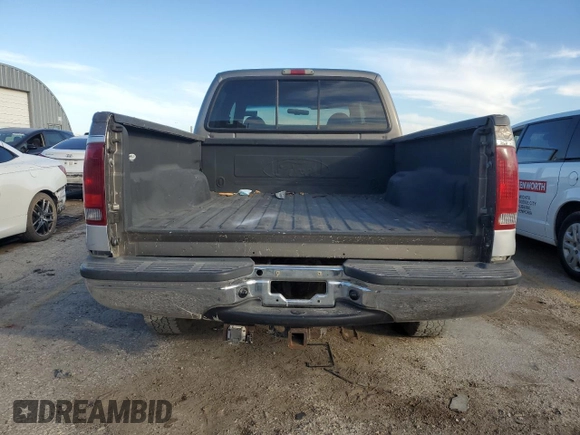 2001 Ford Super Duty F-250 XL with VIN 1FTNW21S11EB85907, listed as a Copart auction lot 82637054 with 159,489 mi miles and Salvage Title. Bid and sale history available at carsss.com. Image 6.