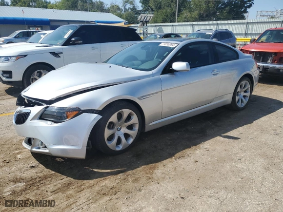 2004 BMW 6 Series 645Ci with VIN WBAEH73464B190870, listed as a Copart auction lot 71056994 with 124,715 mi miles and Salvage Title. Bid and sale history available at carsss.com. Image 1.