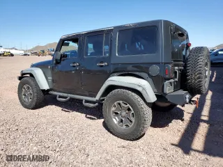 2012 Jeep Wrangler Unlimited Sport with VIN 1C4BJWDGXCL161569, listed as a Copart auction lot 50456355 with 133,703 mi miles and Salvage Title. Bid and sale history available at carsss.com. Image 2.