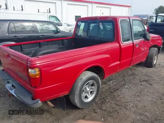 2003 Mazda B-Series 2WD Truck SE with VIN 4F4YR46V33TM13768, listed as a IAAI auction lot 41351910 with 212,641 mi miles. Bid and sale history available at carsss.com. Image 4.