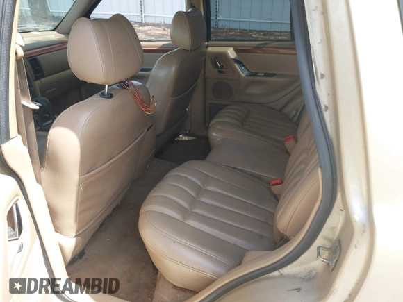 1999 Jeep Grand Cherokee Limited with VIN 1J4GW68S3XC580949, listed as a IAAI auction lot 42502949 with 150,520 mi miles and . Bid and sale history available at DreamBid. Image 8.