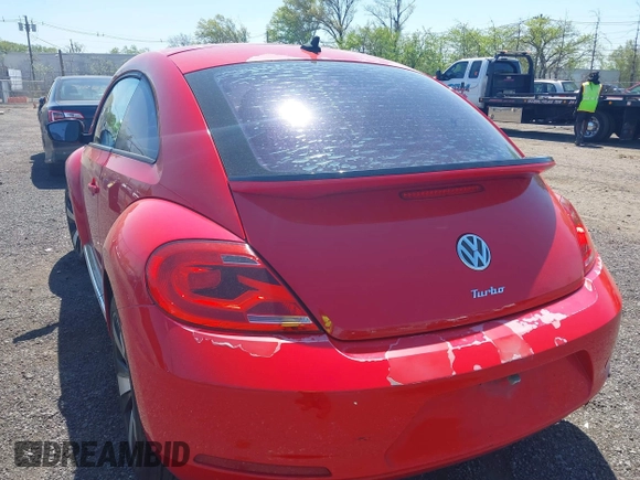 2012 Volkswagen Beetle 2.0T Turbo w/Sun/Snd/Nav PZEV with VIN 3VWVA7AT4CM608798, listed as a IAAI auction lot 42130353 with 152,052 mi miles. Bid and sale history available at carsss.com. Image 6.