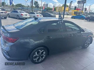 2021 Kia Forte LXS with VIN 3KPF24AD6ME337864, listed as a IAAI auction lot 42472943 with 81,961 mi miles and . Bid and sale history available at DreamBid. Image 6.