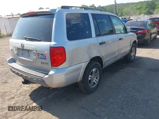 2004 Honda Pilot EX with VIN 2HKYF18504H556213, listed as a IAAI auction lot 42137221 with 225,781 mi miles and . Bid and sale history available at DreamBid. Image 4.