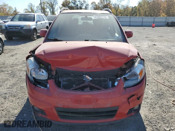 2009 Suzuki SX4 Man Touring Pkg AWD with VIN JS2YB417396202539, listed as a Copart auction lot 77067714 with 142,615 mi miles and Salvage Title. Bid and sale history available at carsss.com. Image 13.