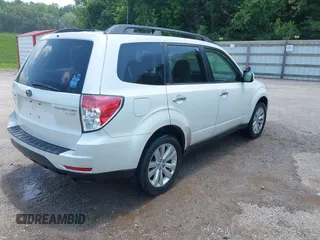 2012 Subaru Forester X Premium with VIN JF2SHADC9CH459997, listed as a IAAI auction lot 42588978 with 112,747 mi miles and . Bid and sale history available at DreamBid. Image 4.