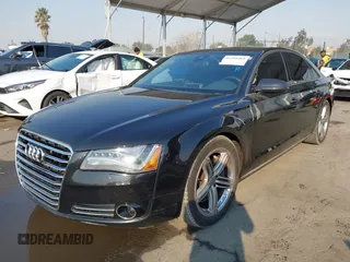 2011 Audi A8 with VIN WAUAVAFD6BN023937, listed as a IAAI auction lot 41288464 with 158,127 mi miles and . Bid and sale history available at DreamBid. Image 17.