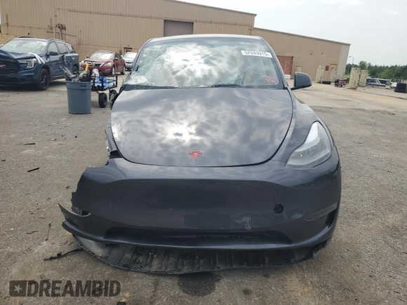 2024 Tesla Model Y z VIN 7SAYGDED4RA331714, wystawiony jako Copart lot #57043915 z przebiegiem Nie podano mil oraz Szkoda całkowita • Salvage title. Historia ofert i sprzedaży dostępna na DreamBid. Obrazek 5.