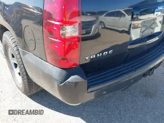 2007 Chevrolet Tahoe LTZ with VIN 1GNFC13J67R245233, listed as a IAAI auction lot 41726159 with 203,841 mi miles and . Bid and sale history available at DreamBid. Image 13.