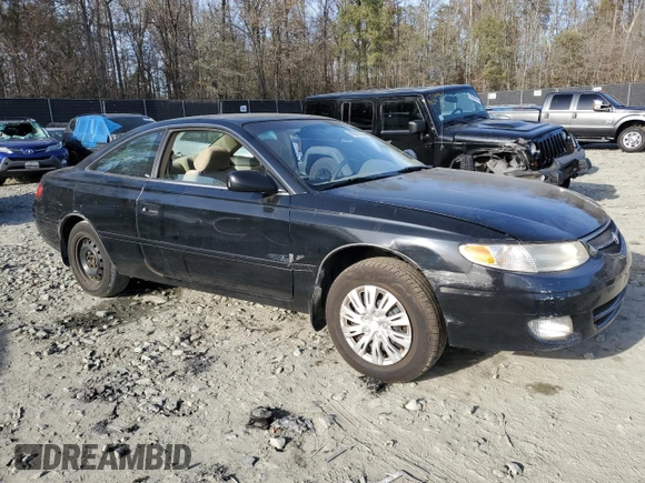 1999 Toyota Solara SE with VIN 2T1CG22P1XC195671, listed as a Copart auction lot 80575724 with 185,634 mi miles and Salvage Title. Bid and sale history available at DreamBid. Image 4.