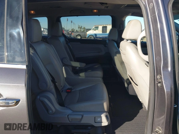 2018 Honda Odyssey Elite with VIN 5FNRL6H91JB052289, listed as a IAAI auction lot 41336068 with 94,685 mi miles and . Bid and sale history available at DreamBid. Image 8.