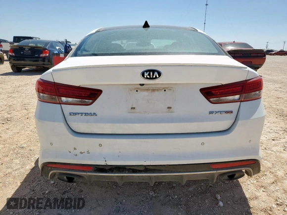2016 Kia Optima SX Turbo z VIN 5XXGW4L20GG017102, wystawiony jako Copart lot #57258965 z przebiegiem 113 303 mil mil oraz Szkoda całkowita • Salvage title. Historia ofert i sprzedaży dostępna na DreamBid. Obrazek 6.