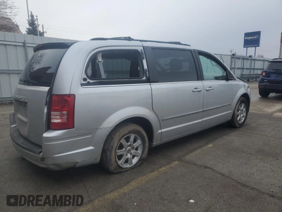2010 Chrysler Town & Country Touring with VIN 2A4RR5DX0AR395333, listed as a Copart auction lot 46805415 with 181,818 mi miles and Salvage Title. Bid and sale history available at DreamBid. Image 3.