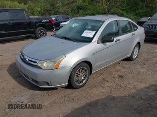 2009 Ford Focus SE with VIN 1FAHP35N69W186180, listed as a IAAI auction lot 41979048 with 179,837 mi miles. Bid and sale history available at carsss.com. Image 2.