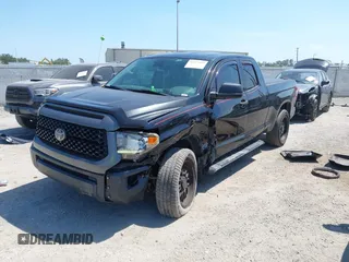 2019 Toyota Tundra SR with VIN 5TFUY5F13KX852912, listed as a IAAI auction lot 42327399 with 124,193 mi miles and . Bid and sale history available at DreamBid. Image 2.