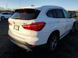 2017 BMW X1 xDrive28i with VIN WBXHT3C39H5F84369, listed as a Copart auction lot 68940992 with 92,054 mi miles. Bid and sale history available at carsss.com. Image 3.