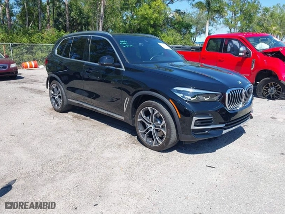 2023 BMW X5 sDrive40i with VIN 5UXCR4C07P9P72263, listed as a IAAI auction lot 41884954 with 34,233 mi miles. Bid and sale history available at carsss.com. Image 1.