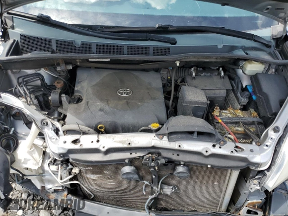 2015 Toyota Sienna LE with VIN 5TDJK3DC8FS104777, listed as a Copart auction lot 63440925 with 195,962 mi miles and Salvage title. Bid and sale history available at DreamBid. Image 12.
