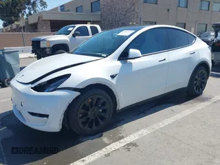 2021 Tesla Model Y Long Range with VIN 5YJYGDEEXMF280480, listed as a IAAI auction lot 41993633 with 69,579 mi miles. Bid and sale history available at carsss.com. Image 23.