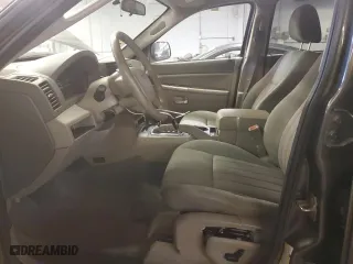 2006 Jeep Grand Cherokee Laredo with VIN 1J4GS48K26C285341, listed as a Copart auction lot 59287334 with 218,787 mi miles and Salvage Title. Bid and sale history available at carsss.com. Image 7.