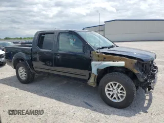 2018 Nissan Frontier SV with VIN 1N6AD0EV5JN745860, listed as a Copart auction lot 61404925 with 63,110 mi miles and Salvage title. Bid and sale history available at DreamBid. Image 4.