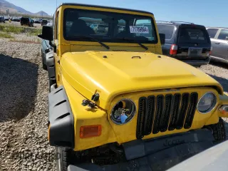 2002 Jeep Wrangler X with VIN 1J4FA39S42P725876, listed as a Copart auction lot 71789864 with 154,991 mi miles and Salvage Title. Bid and sale history available at carsss.com. Image 5.