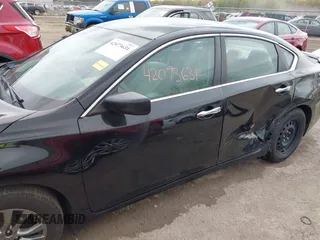 2015 Nissan Altima 2.5 SV with VIN 1N4AL3AP7FC582717, listed as a IAAI auction lot 42073631 with 137,788 mi miles. Bid and sale history available at carsss.com. Image 14.