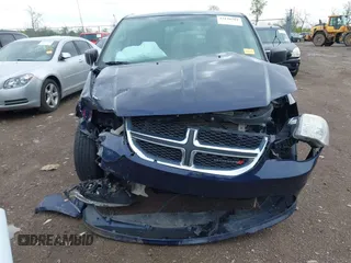 2014 Dodge Grand Caravan American Value with VIN 2C4RDGBG3ER104932, listed as a IAAI auction lot 42126784 with 171,206 mi miles and . Bid and sale history available at DreamBid. Image 6.