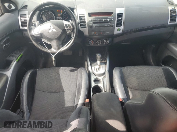 2012 Mitsubishi Outlander SE z VIN JA4AS3AW4CU008418, wystawiony jako Copart lot #57523555 z przebiegiem 179 693 mil mil oraz Czysty tytuł • Clean title. Historia ofert i sprzedaży dostępna na DreamBid. Obrazek 8.