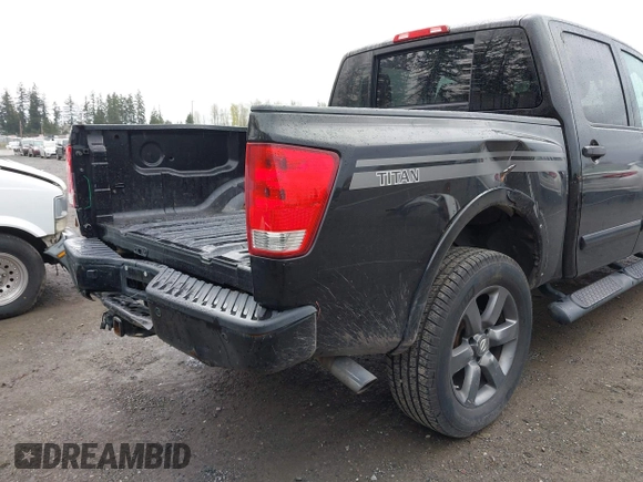 2012 Nissan Titan SV with VIN 1N6BA0EJ0CN303050, listed as a IAAI auction lot 41892370 with 120,018 mi miles. Bid and sale history available at carsss.com. Image 6.