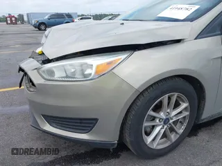2016 Ford Focus SE with VIN 1FADP3F23GL350387, listed as a IAAI auction lot 41948782 with 70,188 mi miles. Bid and sale history available at carsss.com. Image 13.