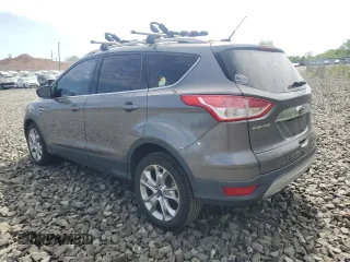 2013 Ford Escape SEL z VIN 1FMCU9HX6DUB05689, wystawiony jako Copart lot #55148765 z przebiegiem 69 178 mil mil oraz Czysty tytuł • Clean title. Historia ofert i sprzedaży dostępna na DreamBid. Obrazek 2.