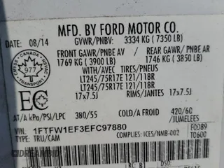 2014 Ford F-150 XL with VIN 1FTFW1EF3EFC97880, listed as a Copart auction lot 64822215 with 105,437 mi miles and Salvage title. Bid and sale history available at DreamBid. Image 13.