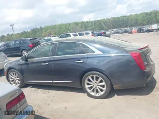 2013 Cadillac XTS Luxury with VIN 2G61P5S36D9214588, listed as a IAAI auction lot 41953947 with 142,204 mi miles. Bid and sale history available at carsss.com. Image 14.