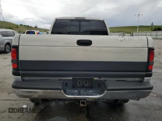 1999 Dodge 2500 z VIN 1B7KF2361XJ509781, wystawiony jako Copart lot #57282495 z przebiegiem 135 666 mil mil oraz Szkoda całkowita • Salvage title. Historia ofert i sprzedaży dostępna na DreamBid. Obrazek 6.