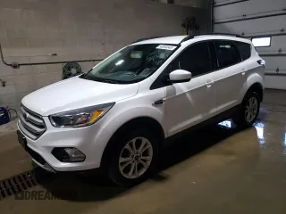 2018 Ford Escape SE z VIN 1FMCU9GD5JUC31559, wystawiony jako Copart lot #56564845 z przebiegiem 213 706 mil mil oraz Czysty tytuł • Clean title. Historia ofert i sprzedaży dostępna na DreamBid. Obrazek 1.