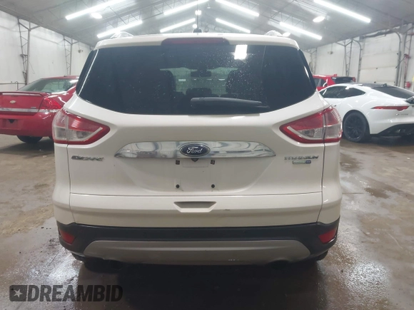 2014 Ford Escape Titanium with VIN 1FMCU9J90EUD21552, listed as a IAAI auction lot 42102148 with 183,539 mi miles. Bid and sale history available at carsss.com. Image 16.