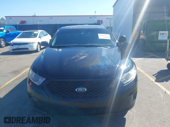 2014 Ford Police Interceptor с VIN 1FAHP2L88EG143746, выставлен на аукционе IAAI как лот 41657116 с пробегом 99 247 миль миль и . История ставок и продаж доступна на DreamBid. Изображение 13.