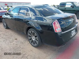 2014 Chrysler 300 S with VIN 2C3CCABG5EH205020, listed as a IAAI auction lot 42247180 with 186,458 mi miles and . Bid and sale history available at DreamBid. Image 3.