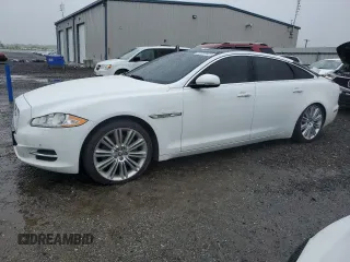 2013 Jaguar XJ Portfolio z VIN SAJWJ2GD3D8V47901, wystawiony jako Copart lot #60997605 z przebiegiem 136 806 mil mil oraz Czysty tytuł • Clean title. Historia ofert i sprzedaży dostępna na DreamBid. Obrazek 1.